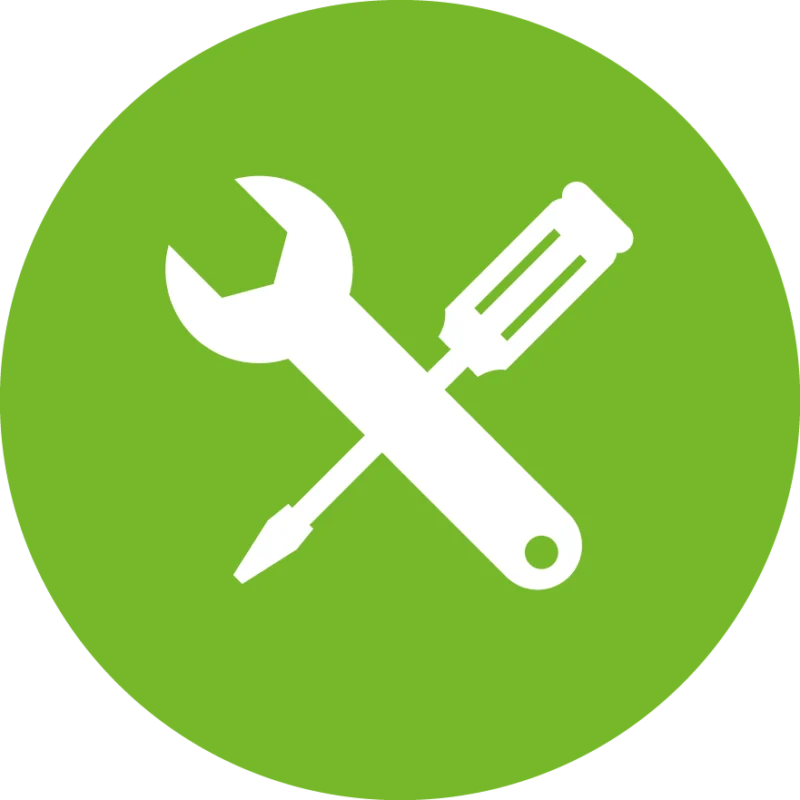 Weißes Piktogramm aus gekreuztem Schraubenschlüssel und Schraubendreher auf grünem, kreisförmigem Hintergrund. Das Symbol steht für Handwerk, Reparatur, Wartung oder technischen Service.